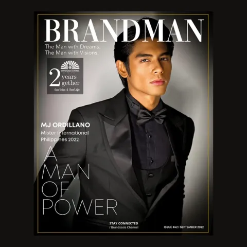 Cover-style graphic titled BRANDMAN on black: a man in a black tuxedo and bow tie, with the headline A MAN OF POWER.