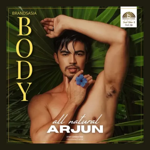 Green leaf-patterned graphic with a large vertical gold word BODY: a shirtless man with one arm raised holding a blue flower.